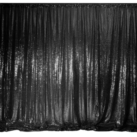 Black sequin photo booth backdrop.