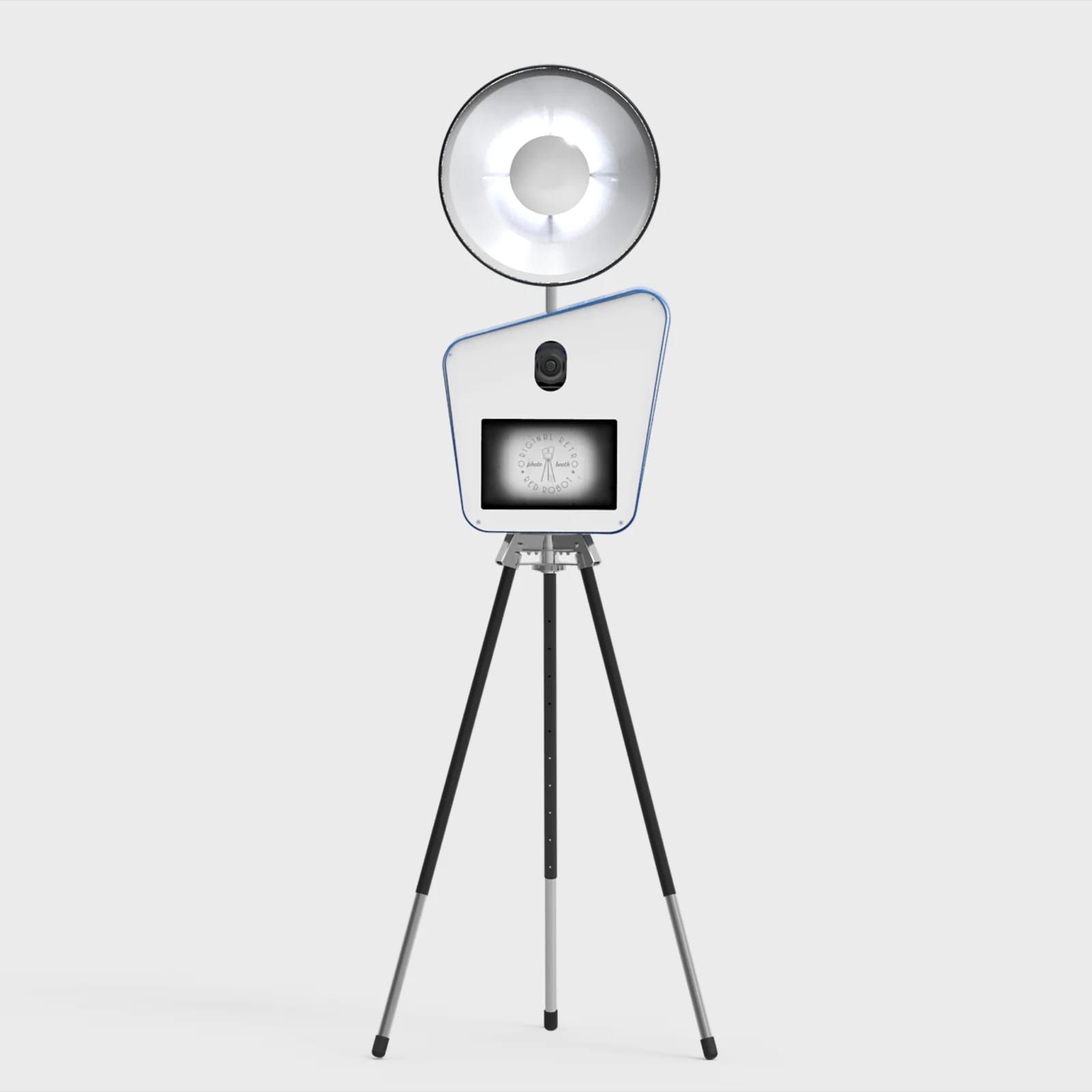 Retro photo booth on a tripod with a large dish ring light and a camera above a small screen.